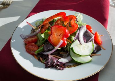 Salad with fresh bell pepper, onion, tomato and cucumber