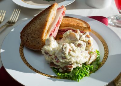 Ham and cheese sandwich and potato salad